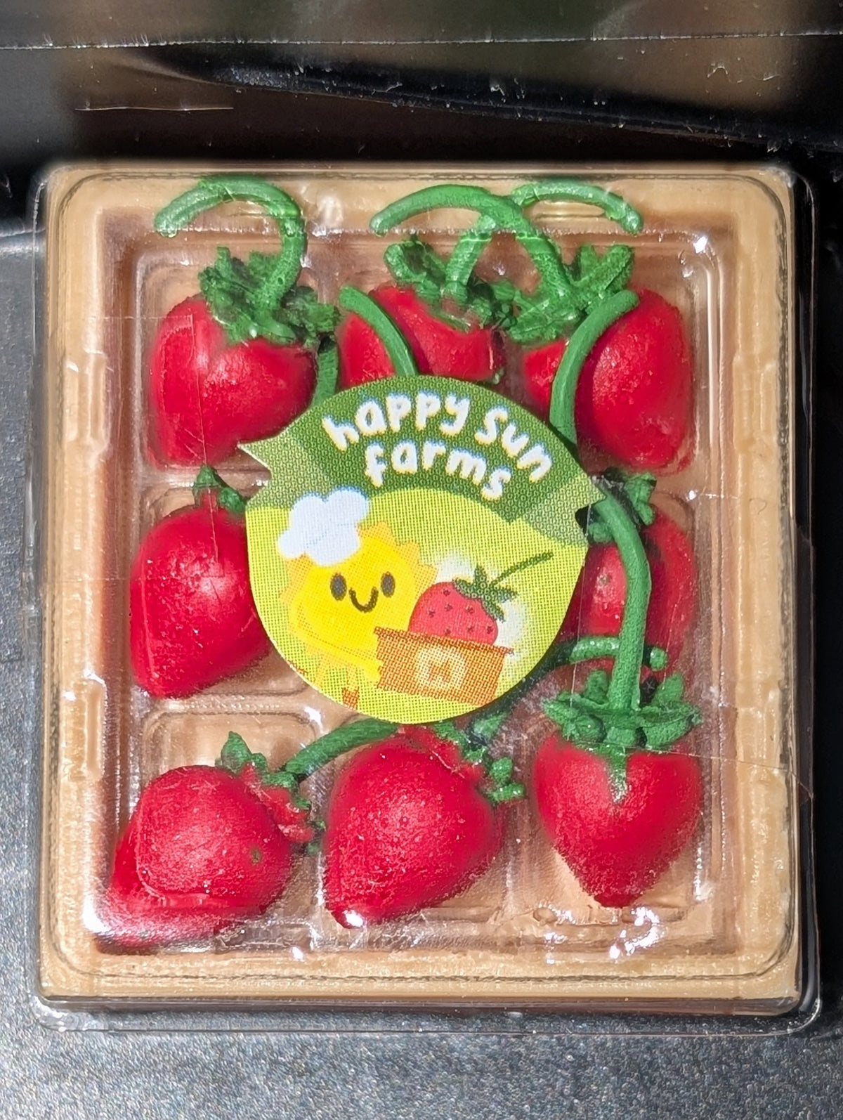 Strawberry with stems in crate