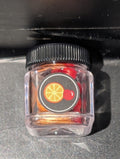 Oranges and cherries in jar